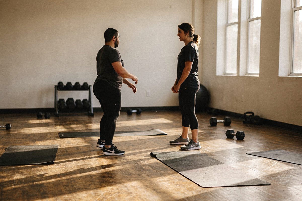 Coach and client working on movement technique across the studio floor at Totex Movement Studio
